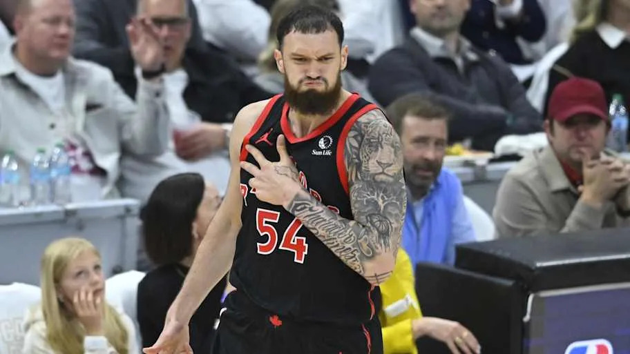 Toronto Raptors forward Sandro Mamukelashvili celebrates his three-point basket against the Cleveland Cavaliers