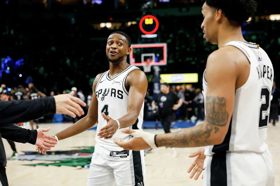 San Antonio Spurs guard De'aaron Fox (4) celebrates the Spurs' win after Game 3 of the Western Conference semifinals at Target Center in Minneapolis, Friday, May 8, 2026. The Spurs defeated the Timberwolves 115-108, leading the series 2-1. (Sam Owens/San Antonio Express-News)