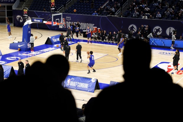 Nate Ament shoots while people watch the NBA draft combine Tuesday, May 12, 2026, at Wintrust Arena. (Eileen T. Meslar/Chicago Tribune)