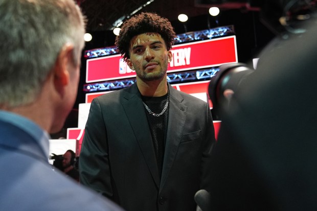 Duke forward Cameron Boozer talks to media during the NBA draft lottery Sunday, May 10, 2026, at Navy Pier. (AP Photo/Nam Y. Huh)
