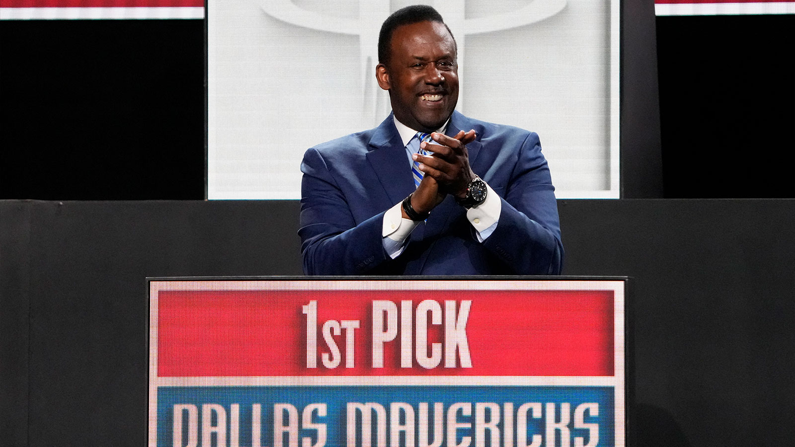 Rolando Blackman of the Dallas Mavericks reacts after winning the the first pick during the 2025 NBA Draft Lottery at McCormick Place. 