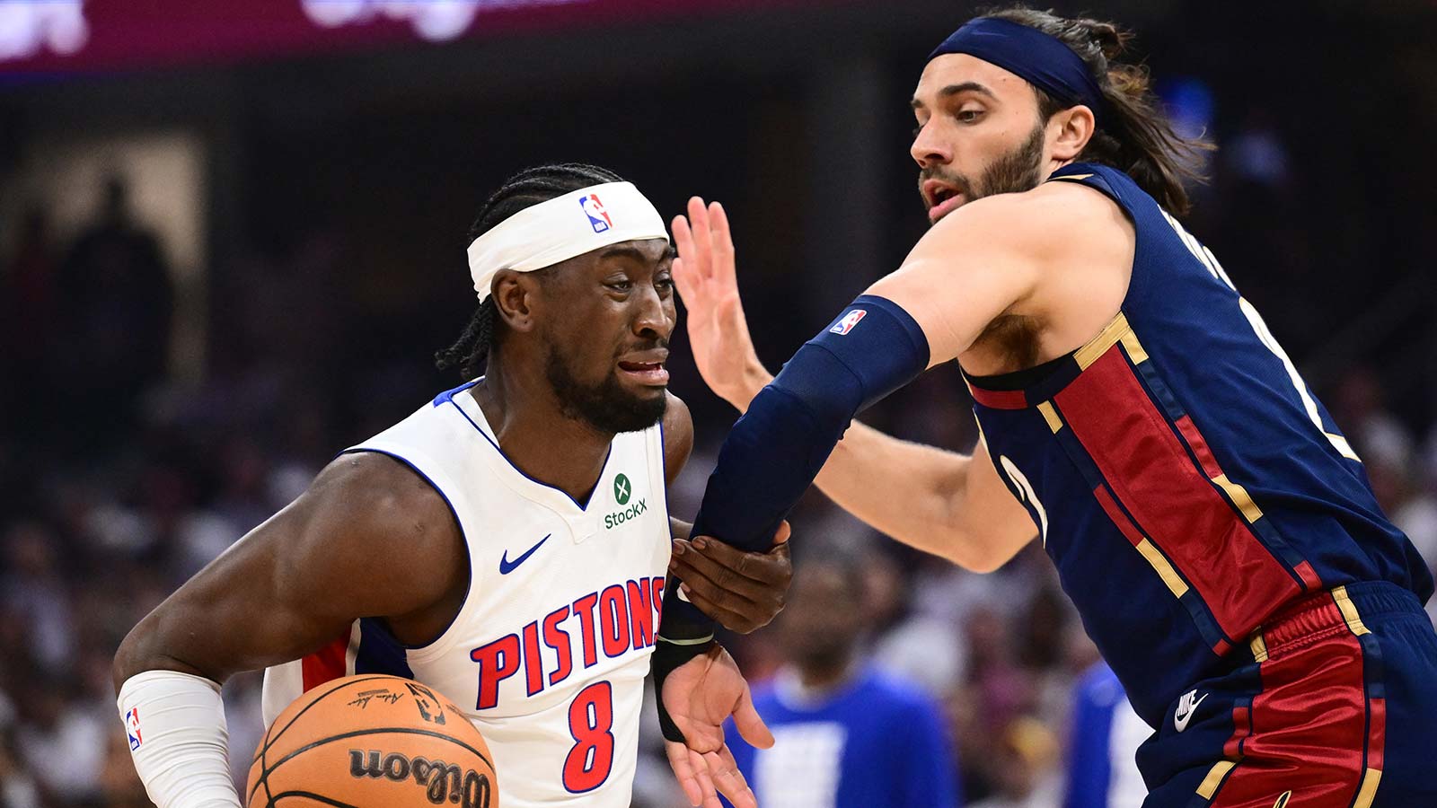 Detroit Pistons guard Caris LeVert (8) drives to the basket against Cleveland Cavaliers guard Max Strus (2) during the first half of game three in the second round of the 2026 NBA Playoffs at Rocket Arena.