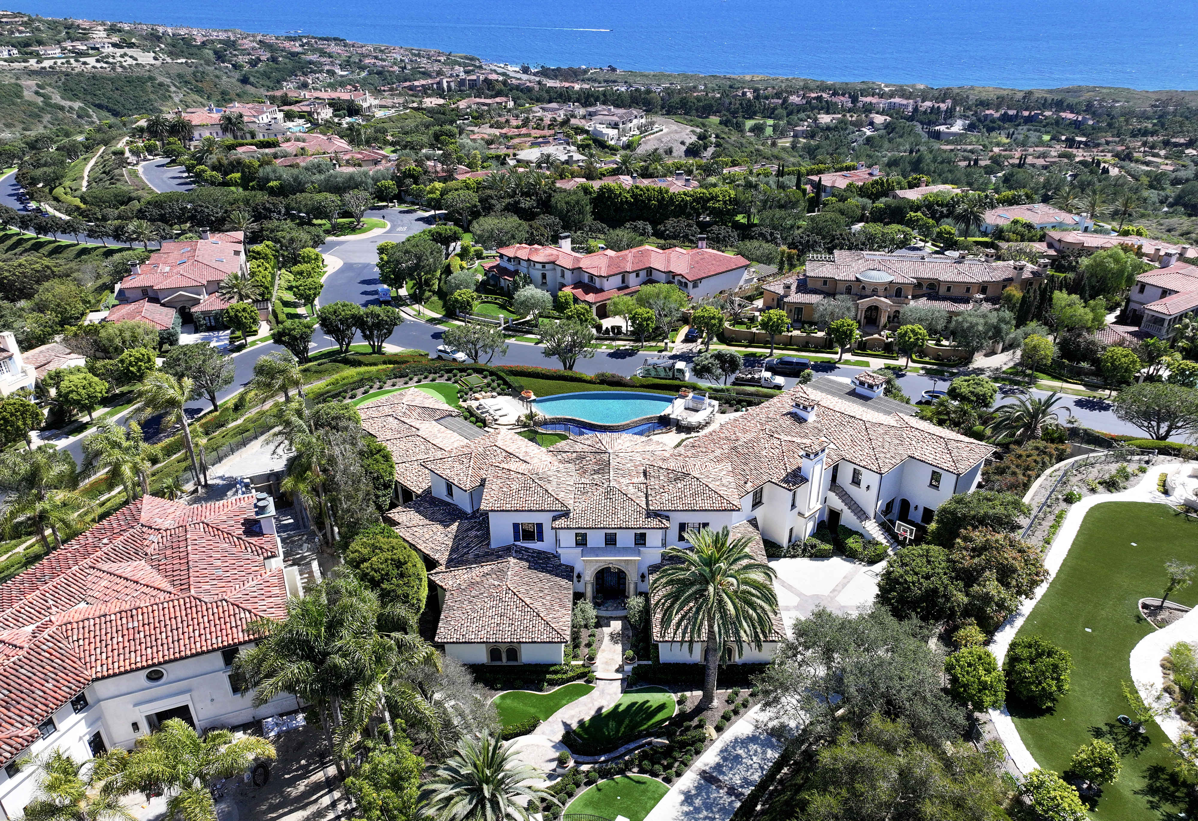 An 11,200 square feet Newport Coast estate in the gated...