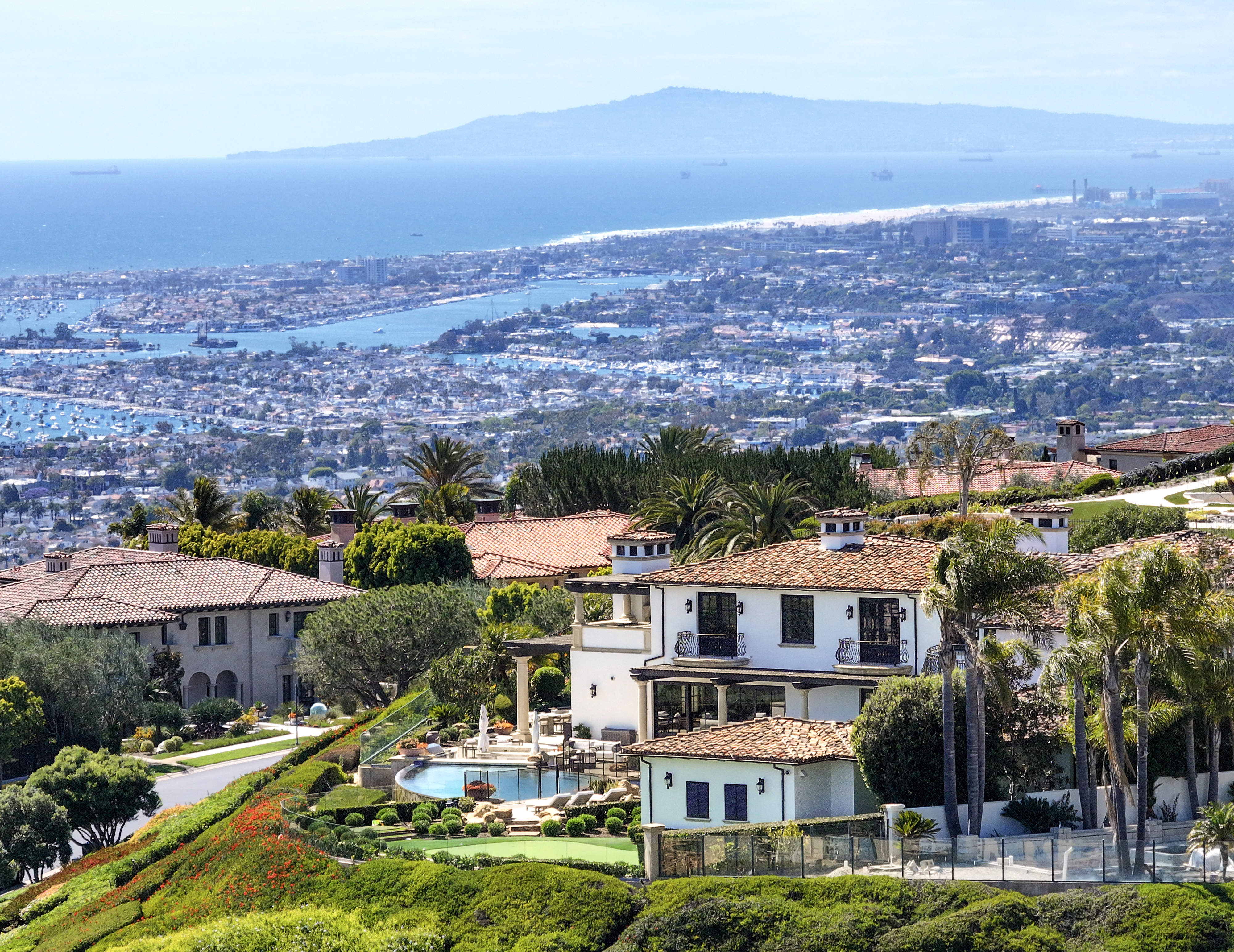 An 11,200 square feet Newport Coast estate in the gated...
