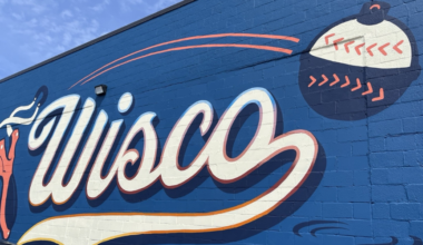 The new Brewers mural "The Launch" on Slingshot Bar exterior.