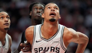 San Antonio Spurs forward/center Victor Wembanyama (1) and Portland Trail Blazers guard Sidy Cissoko watch for the rebound during the second half in Game 4 of a first-round NBA basketball playoffs series in Portland, Ore., Sunday, April 26, 2026. (AP Photo/Jenny Kane)
