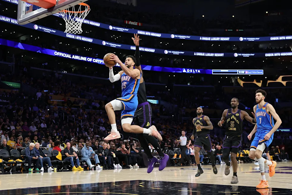 LOS ANGELES, CALIFORNIA - MAY 11: Ajay Mitchell #25 of the Oklahoma City Thunder goes for a layup against Rui Hachimura #28 of the Los Angeles Lakers during the third quarter in Game Four of the Second Round of the NBA Western Conference Playoffs at Crypto.com Arena on May 11, 2026 in Los Angeles, California. NOTE TO USER: User expressly acknowledges and agrees that, by downloading and or using this photograph, User is consenting to the terms and conditions of the Getty Images License Agreement. (Photo by Luke Hales/Getty Images)