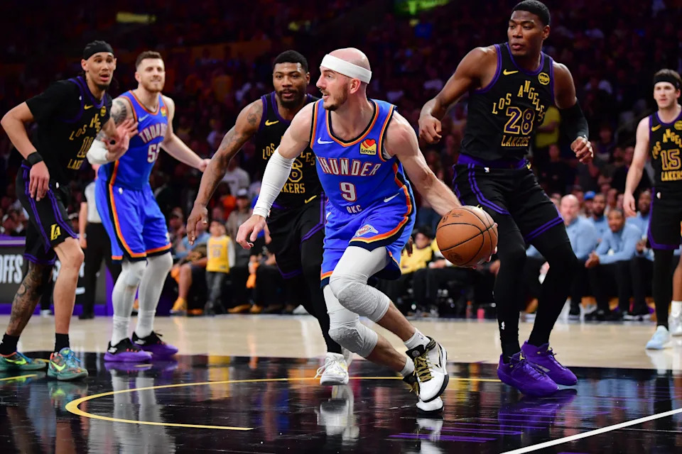 May 11, 2026; Los Angeles, California, USA; Oklahoma City Thunder guard Alex Caruso (9) controls the ball against Los Angeles Lakers forward Rui Hachimura (28) during the second half in game four of the second round of the 2026 NBA Playoffs at Crypto.com Arena. Mandatory Credit: Gary A. Vasquez-Imagn Images