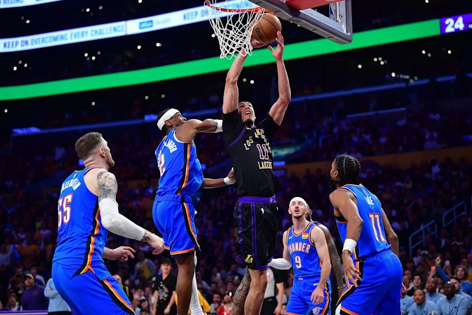 May 11, 2026; Los Angeles, California, USA; Los Angeles Lakers center Jaxson Hayes (11) moves to the basket against Oklahoma City Thunder guard Shai Gilgeous-Alexander (2) during the first half in game four of the second round of the 2026 NBA Playoffs at Crypto.com Arena. Mandatory Credit: Gary A. Vasquez-Imagn Images