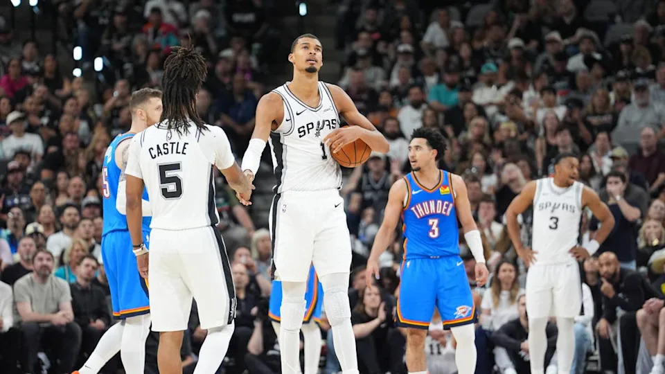San Antonio Spurs center Victor Wembanyama (1) high fives guard <a class="link " href="https://sports.yahoo.com/nba/players/10290/" data-i13n="sec:content-canvas;subsec:anchor_text;elm:context_link" data-ylk="slk:Stephon Castle;sec:content-canvas;subsec:anchor_text;elm:context_link;itc:0" data-yga="{"yLinkElement":"context_link","yModuleName":"content-canvas","yLinkText":"Stephon Castle","ySubModuleName":"anchor_text","yHasCommerce":false}">Stephon Castle</a> (5). Daniel Dunn-Imagn Images