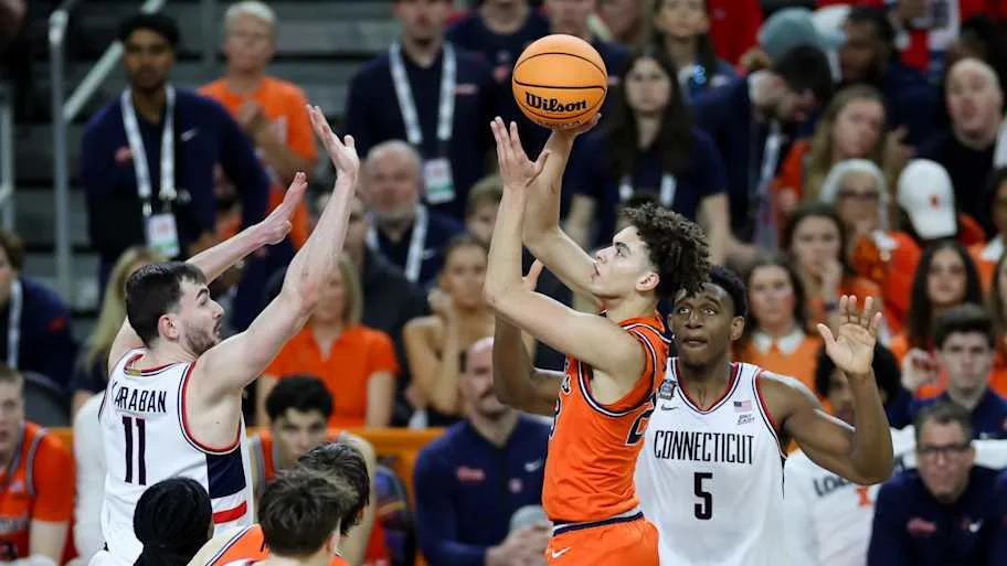 Keaton Wagler shoots the ball against UConn
