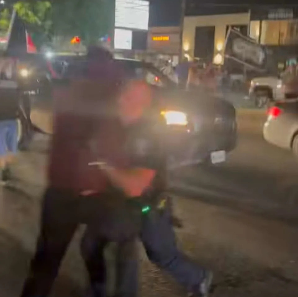 A video depicting officers from the San Antonio Police Department carrying out multiple arrests on celebrating Spurs fans after the team's Wednesday night win against the Minnesota Timberwolves has gone viral on social media. (Courtesy of John Doee via Facebook)