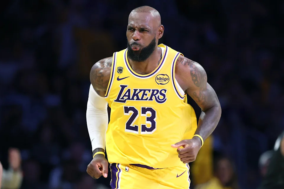 LeBron James runs back on defense after hitting a three-pointer during the Lakers' Game 1 win over the Houston Rockets in the NBA Playoffs. 