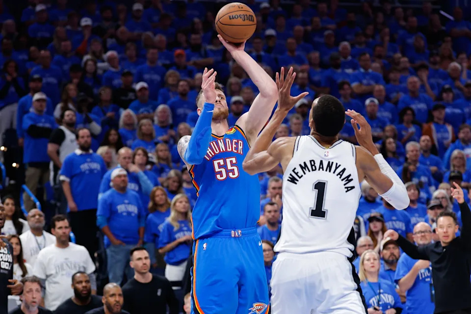 May 20, 2026; Oklahoma City, Oklahoma, USA; Oklahoma City Thunder center Isaiah Hartenstein (55) takes a shot as San Antonio Spurs forward Victor Wembanyama (1) defends during the fourth quarter during game two of the western conference finals for the 2026 NBA playoffs at Paycom Center. Mandatory Credit: Alonzo Adams-Imagn Images