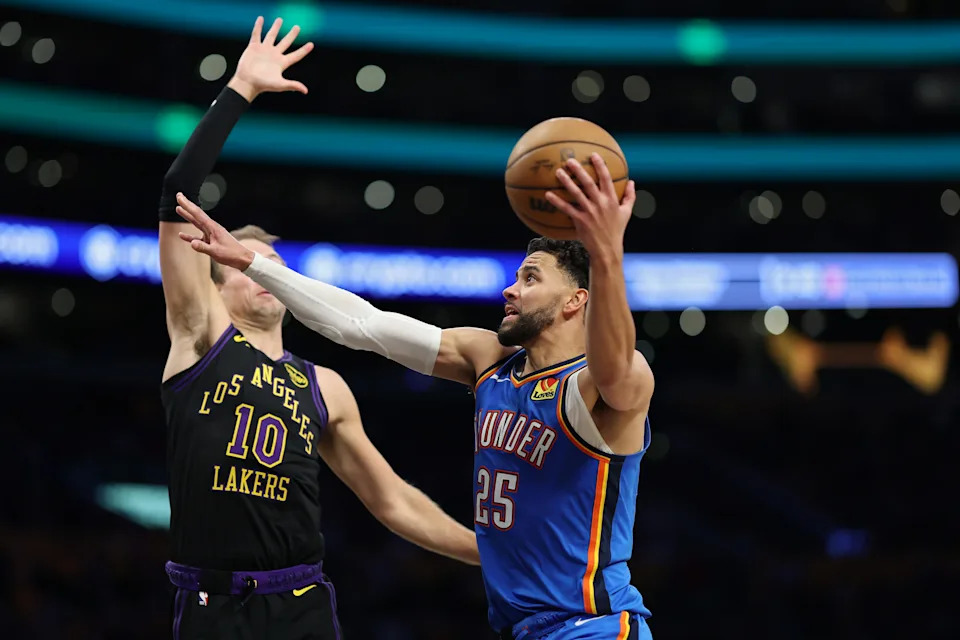 LOS ANGELES, CALIFORNIA - MAY 11: Ajay Mitchell #25 of the Oklahoma City Thunder goes for a layup against Luke Kennard #10 of the Los Angeles Lakers during the third quarter in Game Four of the Second Round of the NBA Western Conference Playoffs at Crypto.com Arena on May 11, 2026 in Los Angeles, California. NOTE TO USER: User expressly acknowledges and agrees that, by downloading and or using this photograph, User is consenting to the terms and conditions of the Getty Images License Agreement. (Photo by Luke Hales/Getty Images)