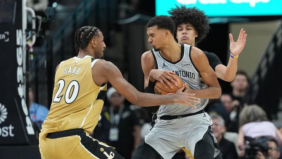 San Antonio Spurs Center Victor Wembanyama, Washington Wizards Center Alex Sarr and Forward Kyshawn George