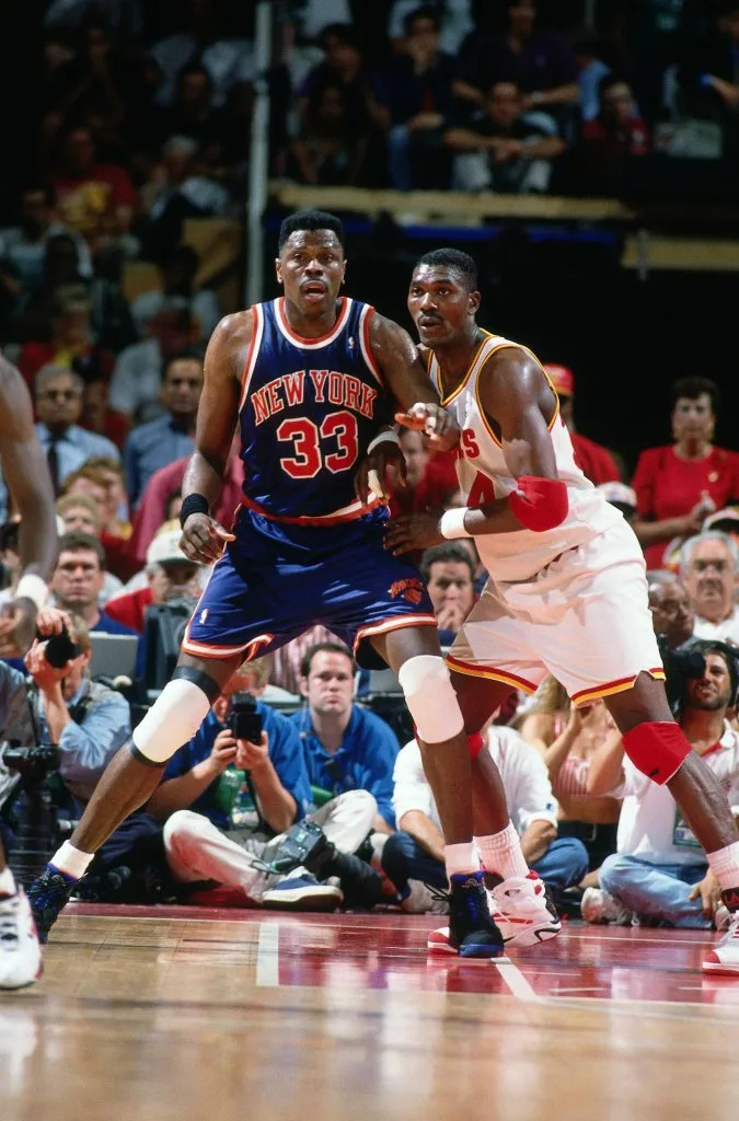 Patrick Ewing of the Knicks posts up against Hakeem Olajuwon of the Rockets during Game 1 of the NBA Finals played on June 8, 1994 at The Summit in Houston, Texas. NBAE via Getty Images