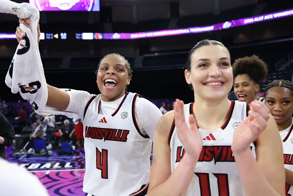 DULUTH, GEORGIA - MARCH 07: MacKenly Randolph #4 and Elif Istanbulluoglu #11 of the Louisville Cardinals react after their win over the North Carolina Tar Heels during the semifinals of the Women's ACC Tournament between the Louisville Cardinals and North Carolina Tar Heels at Gas South Arena on March 07, 2026 in Duluth, Georgia. (Photo by Kevin C. Cox/Getty Images)