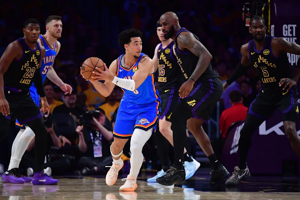 May 11, 2026; Los Angeles, California, USA; Oklahoma City Thunder guard Jared McCain (3) passes the ball against Los Angeles Lakers forward LeBron James (23) during the first half in game four of the second round of the 2026 NBA Playoffs at Crypto.com Arena. Mandatory Credit: Gary A. Vasquez-Imagn Images