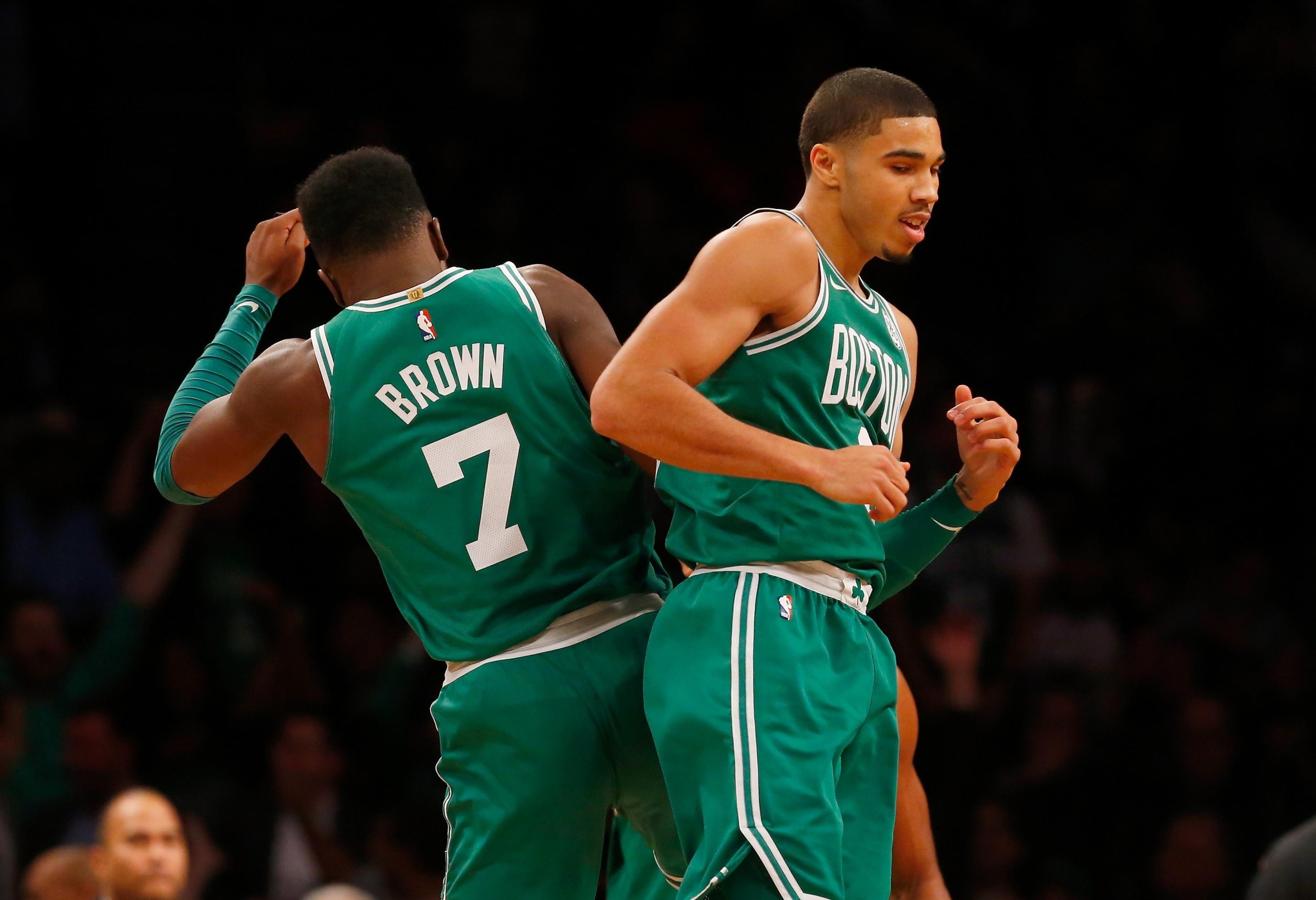 BROOKLYN, NY - NOVEMBER 14: (NEW YORK DAILIES OUT) Jayson Tatum #0 and Jaylen Brown #7 of the Boston Celtics in action against the Brooklyn Nets at Barclays Center on November 14, 2017 in the Brooklyn borough of New York City. The Celtics defeated the Nets 109-102. NOTE TO USER: User expressly acknowledges and agrees that, by downloading and/or using this photograph, user is consenting to the terms and conditions of the Getty Images License Agreement. (Photo by Jim McIsaac/Getty Images)