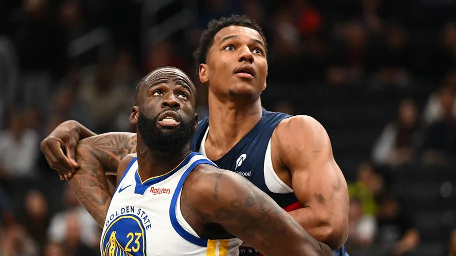 Golden State Warriors Forward Draymond Green and Washington Wizards Center Julian Reese