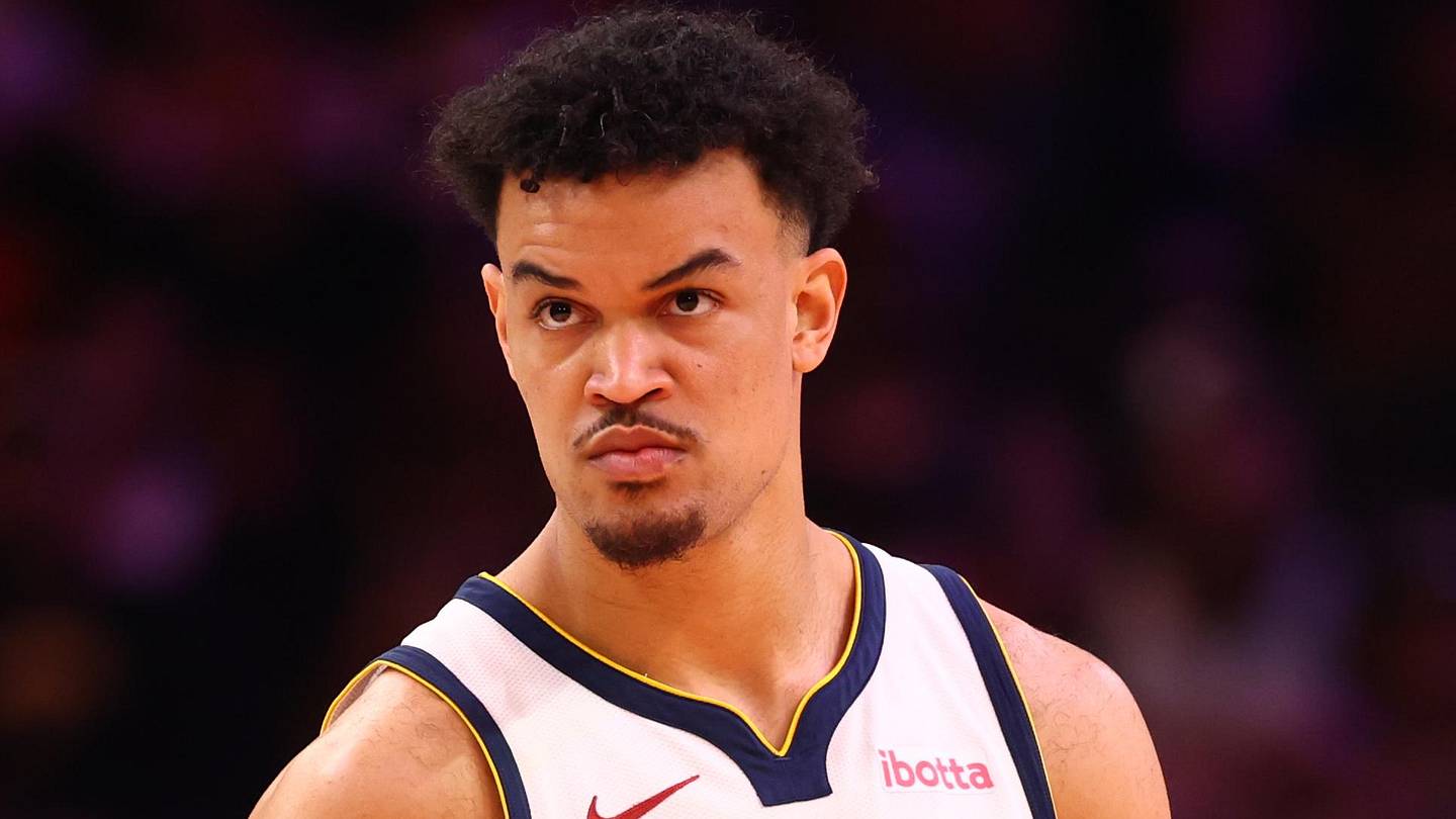 Mar 24, 2026; Phoenix, Arizona, USA; Denver Nuggets forward Spencer Jones (21) against the Phoenix Suns at Mortgage Matchup Center. Mandatory Credit: Mark J. Rebilas-Imagn Images