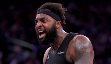 Dec 19, 2025; New York, New York, USA; New York Knicks center Mitchell Robinson (23) reacts after a dunk against the Philadelphia 76ers during the second quarter at Madison Square Garden. Mandatory Credit: Brad Penner-Imagn Images
