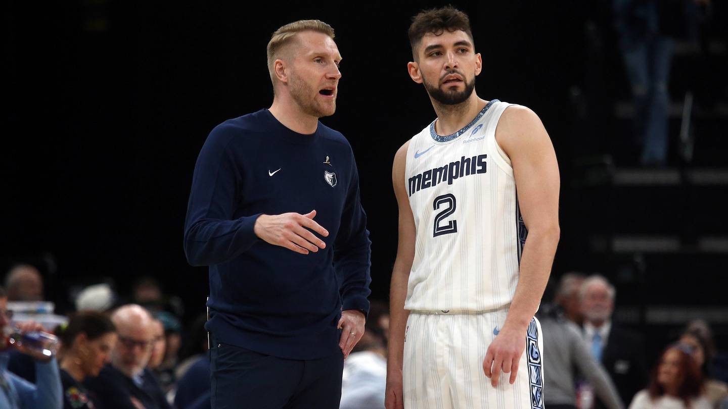Mar 20, 2026; Memphis, Tennessee, USA; Memphis Grizzlies head coach Tuomas Iisalo talks with guard Ty Jerome (2) during the second quarter against the Boston Celtics at FedExForum. Mandatory Credit: Petre Thomas-Imagn Images