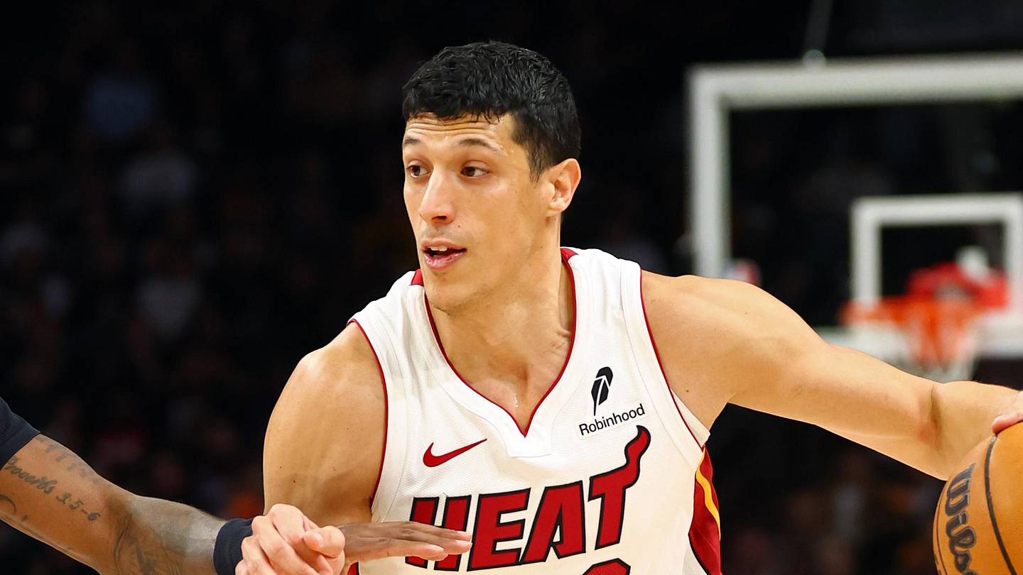 Jan 25, 2026; Phoenix, Arizona, USA; Miami Heat forward Simone Fontecchio (0) against the Phoenix Suns at Mortgage Matchup Center. Mandatory Credit: Mark J. Rebilas-Imagn Images