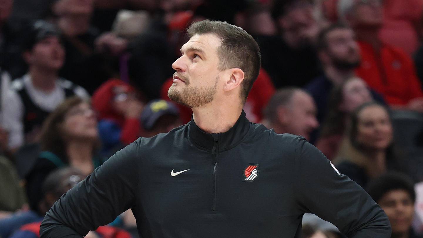 Apr 10, 2026; Portland, Oregon, USA;  Portland Trail Blazers interim head coach Tiago Splitter looks at a replay on the monitor during the first half against the LA Clippers at Moda Center. Mandatory Credit: Jaime Valdez-Imagn Images