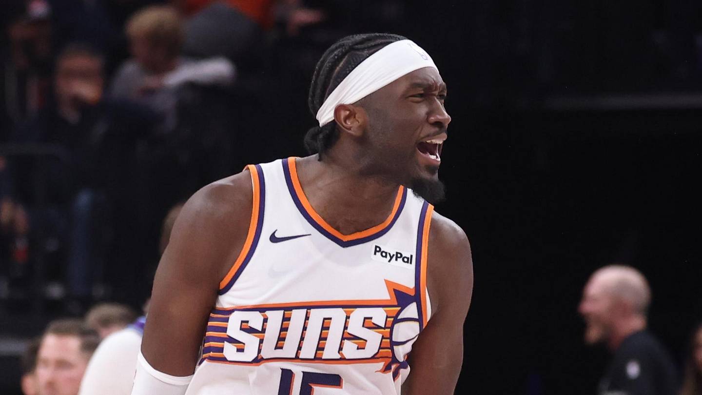 Oct 27, 2025; Salt Lake City, Utah, USA; Phoenix Suns center Mark Williams (15) reacts to tipping a ball in for a basket to tie the game against the Utah Jazz in the last seconds of the fourth quarter at Delta Center. Mandatory Credit: Rob Gray-Imagn Images