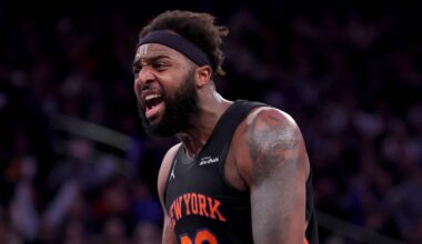 Dec 19, 2025; New York, New York, USA; New York Knicks center Mitchell Robinson (23) reacts after a dunk against the Philadelphia 76ers during the second quarter at Madison Square Garden. Mandatory Credit: Brad Penner-Imagn Images