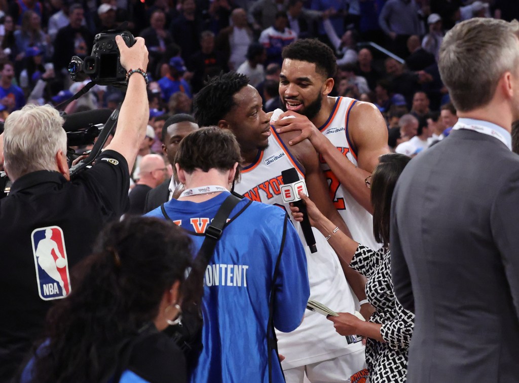 Karl-Anthony Towns celebrates with OG Anunoby as the Knicks beat the Spurs in Game 4 of the NBA Finals on June 10, 2026.