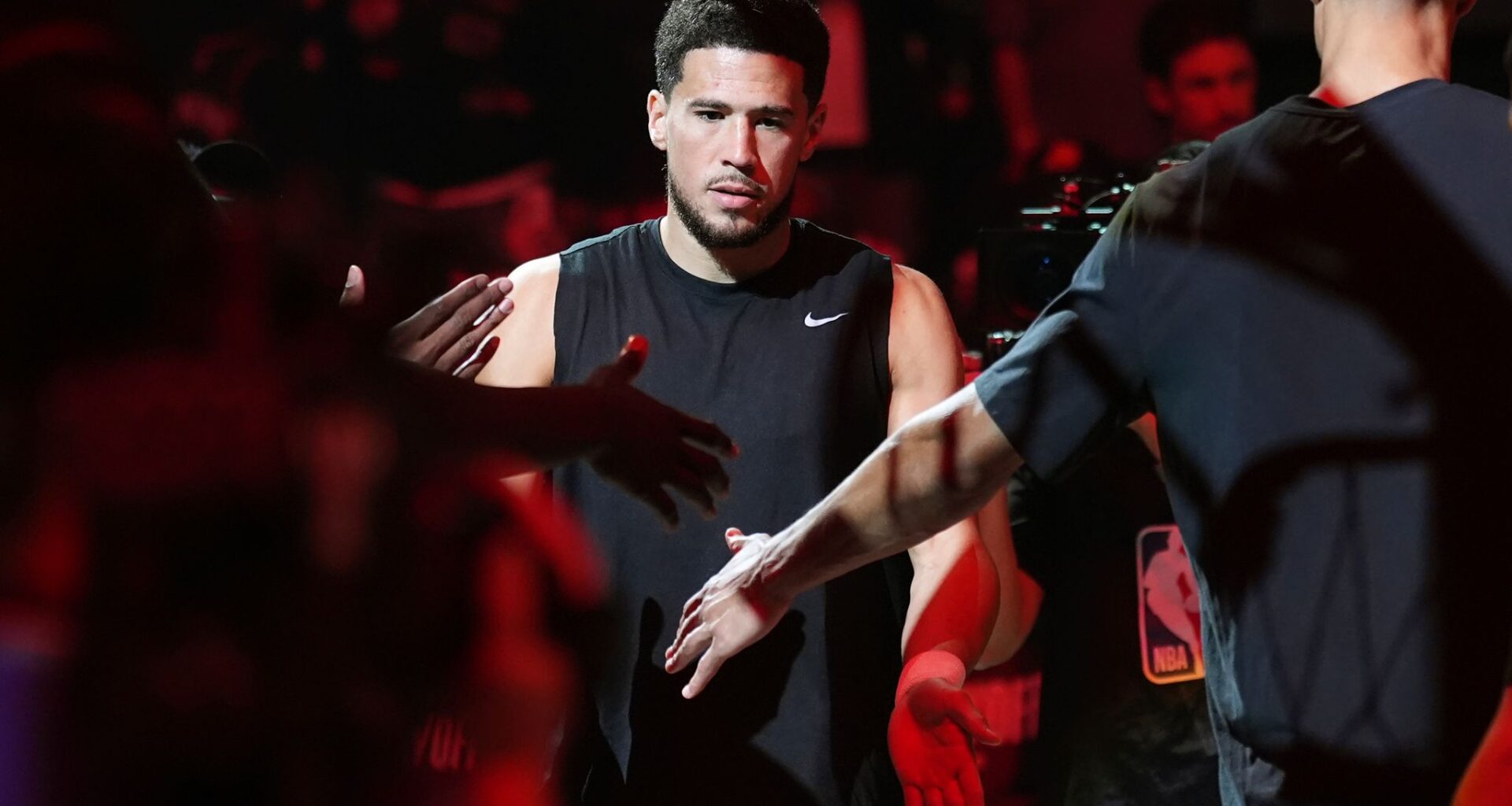 Suns' All-Star guard Devin Booker changes jersey number to No. 15 in honor of his dad Melvin