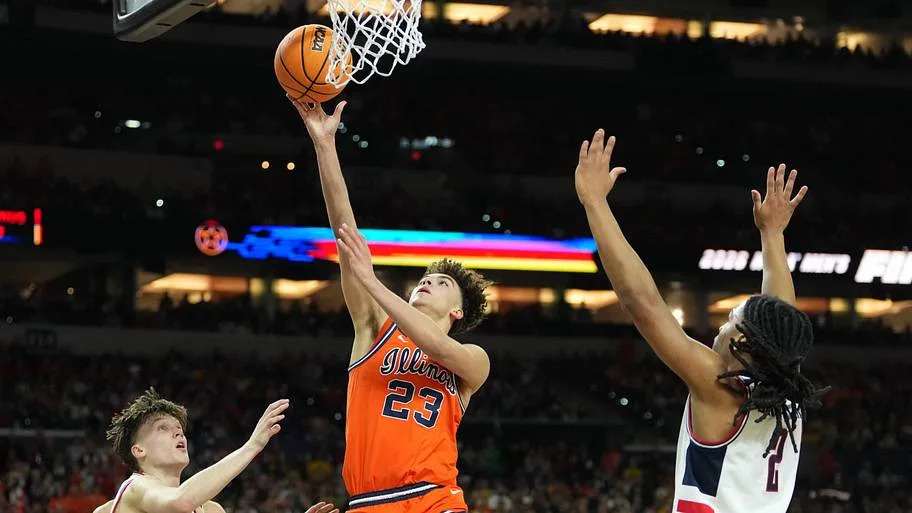 Illinois Fighting Illini guard Keaton Wagler (23) shoots against the Connecticut Huskies. Credit: Robert Deutsch-Imagn Images