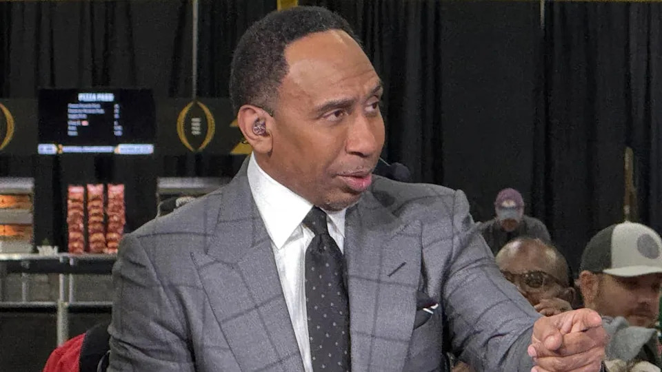 Jan 20, 2025; Atlanta, GA, USA; ESPN personality Stephen A. Smith on the ESPN First Take set at the CFP Fan Central at the George World Congress Center.Kirby Lee-Imagn Images.