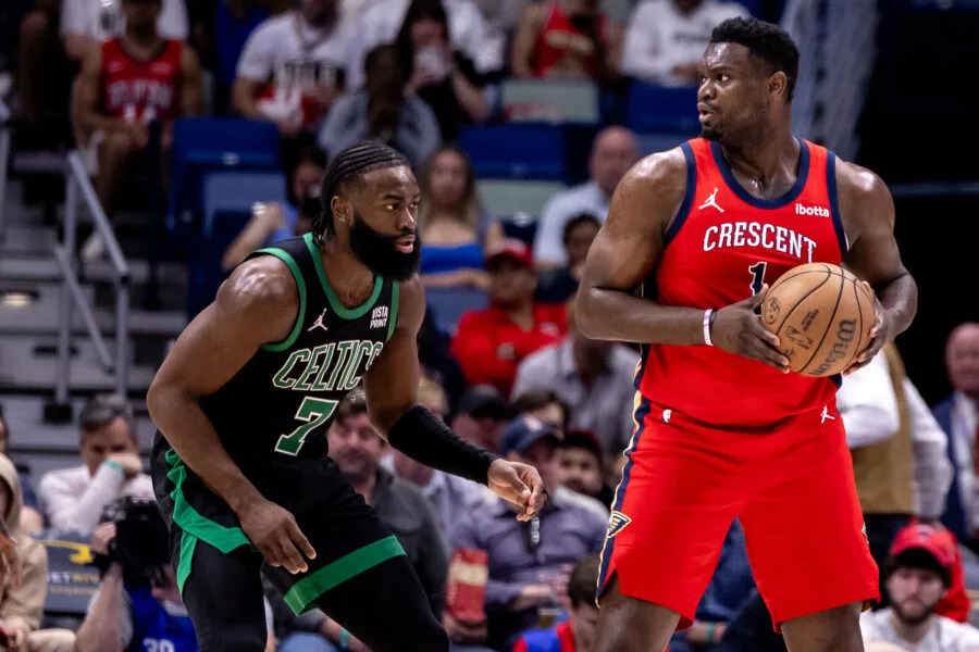Mar 30, 2024; New Orleans, Louisiana, USA; New Orleans Pelicans forward Zion Williamson (1) looks to pass the ball against Boston Celtics guard Jaylen Brown (7) during the first half at Smoothie King Center. Mandatory Credit: Stephen Lew-USA TODAY Sports