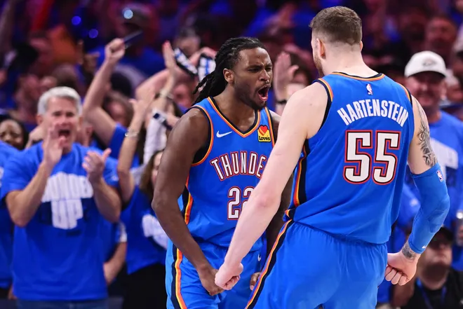 OKLAHOMA CITY, OKLAHOMA - MAY 18: Cason Wallace #22 celebrates with Isaiah Hartenstein #55 of the Oklahoma City Thunder during the third quarter of a game against the Denver Nuggets in Game Seven of the Western Conference Second Round NBA Playoffs at Paycom Center on May 18, 2025 in Oklahoma City, Oklahoma. NOTE TO USER: User expressly acknowledges and agrees that, by downloading and or using this photograph, User is consenting to the terms and conditions of the Getty Images License Agreement. (Photo by Joshua Gateley/Getty Images)