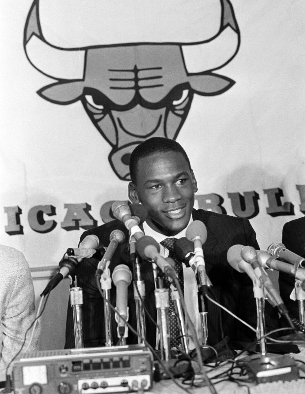 Michael Jordan talks at a news conference on Sept. 12, 1984, in Chicago, after signing a seven-year contract with the Chicago Bulls. (Charles Knoblock/AP)