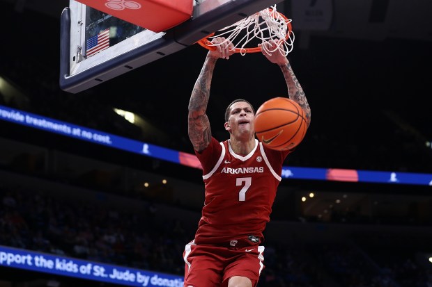 Trevon Brazile #7 of the Arkansas Razorbacks goes to the basket during the second half against the Memphis Tigers of Hoops for St. Jude Tip Off Classic at FedExForum on October 27, 2025 in Memphis, Tennessee. (Photo by Justin Ford/Getty Images)