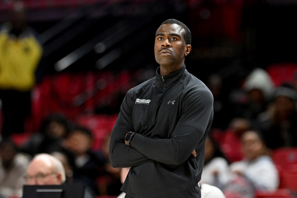 Interim head coach Dwan McMillan of the Wagner Seahawks watches the game in the first half against the Maryland Terrapins at Xfinity Center on December 02, 2025 in College Park, Maryland.