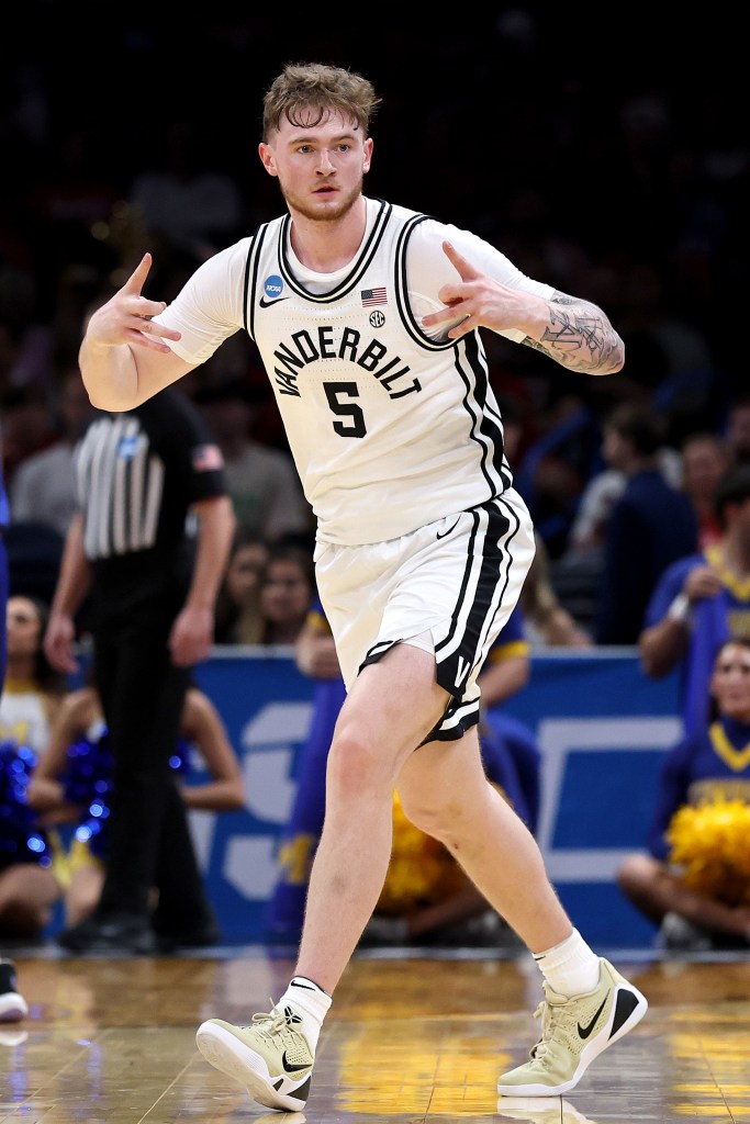 Tyler Nickel #5 of the Vanderbilt Commodores reacts after his three point basket against the McNeese Cowboys during the first half in the first round of the 2026 NCAA Men's Basketball Tournament at Paycom Center on March 19, 2026 in Oklahoma City, Oklahoma.
