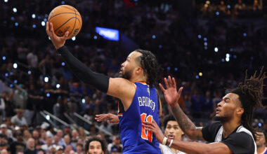 Jalen Brunson #11 of the New York Knicks shoots the ball past Stephon Castle #5 of the San Antonio Spurs during the fourth quarter in Game Five of the 2026 NBA Finals at Frost Bank Center on June 13, 2026 in San Antonio, Texas.