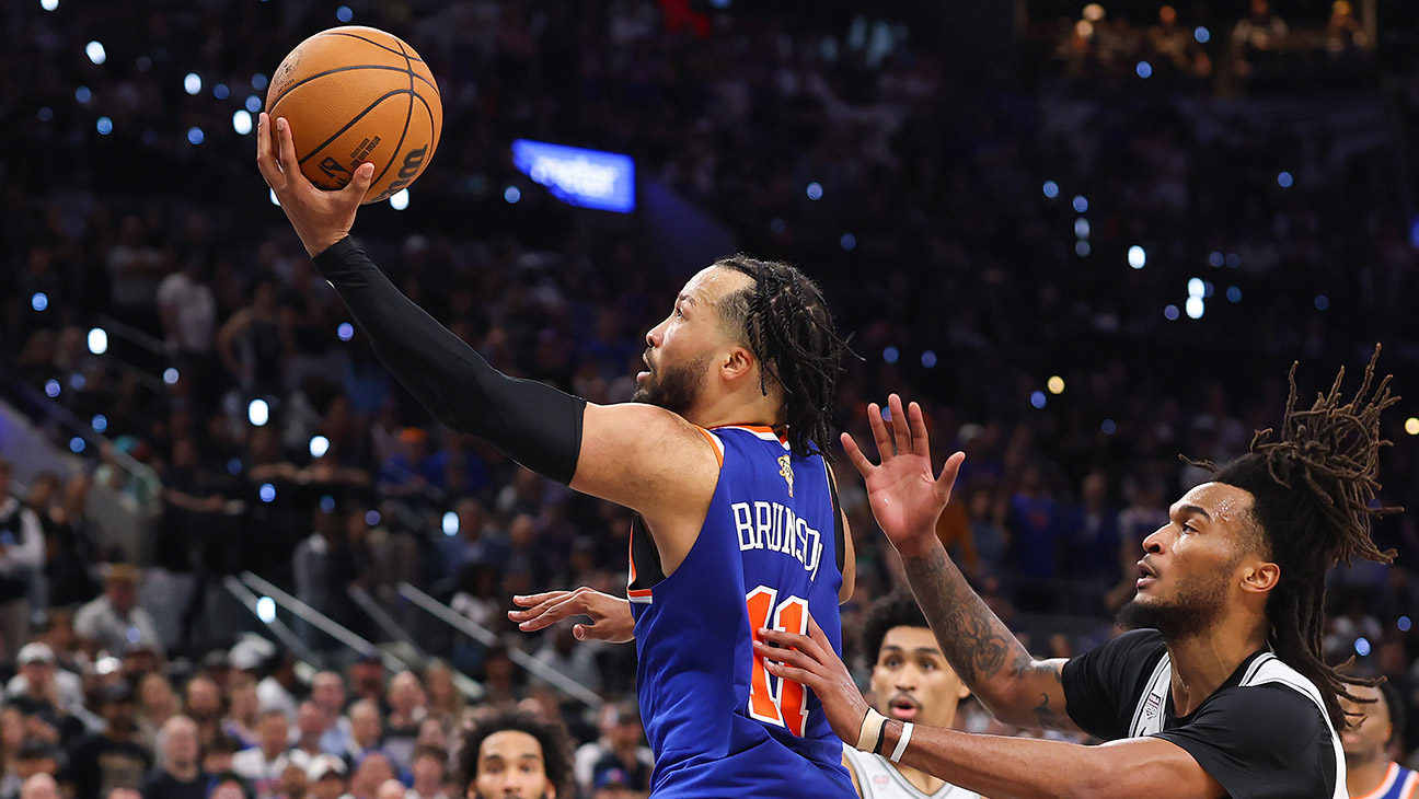 Jalen Brunson #11 of the New York Knicks shoots the ball past Stephon Castle #5 of the San Antonio Spurs during the fourth quarter in Game Five of the 2026 NBA Finals at Frost Bank Center on June 13, 2026 in San Antonio, Texas.