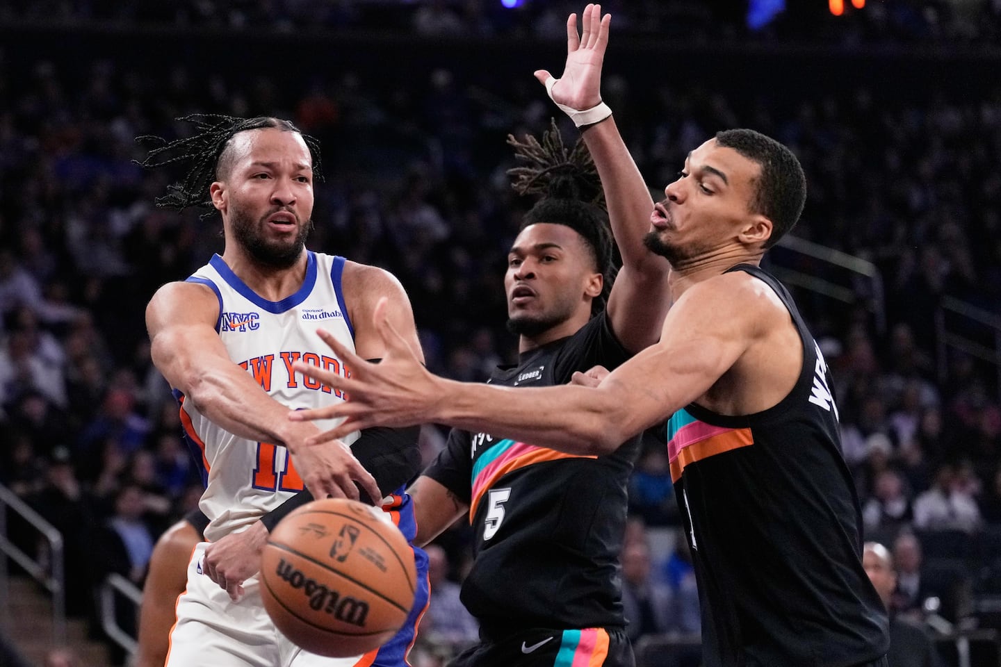 It's the Knicks led by guard Jalen Brunson (left) against the Spurs and their unicorn of a star, 7-foot-4-inch center Victor Wembanyama (right), in the NBA Finals starting Wednesday night.