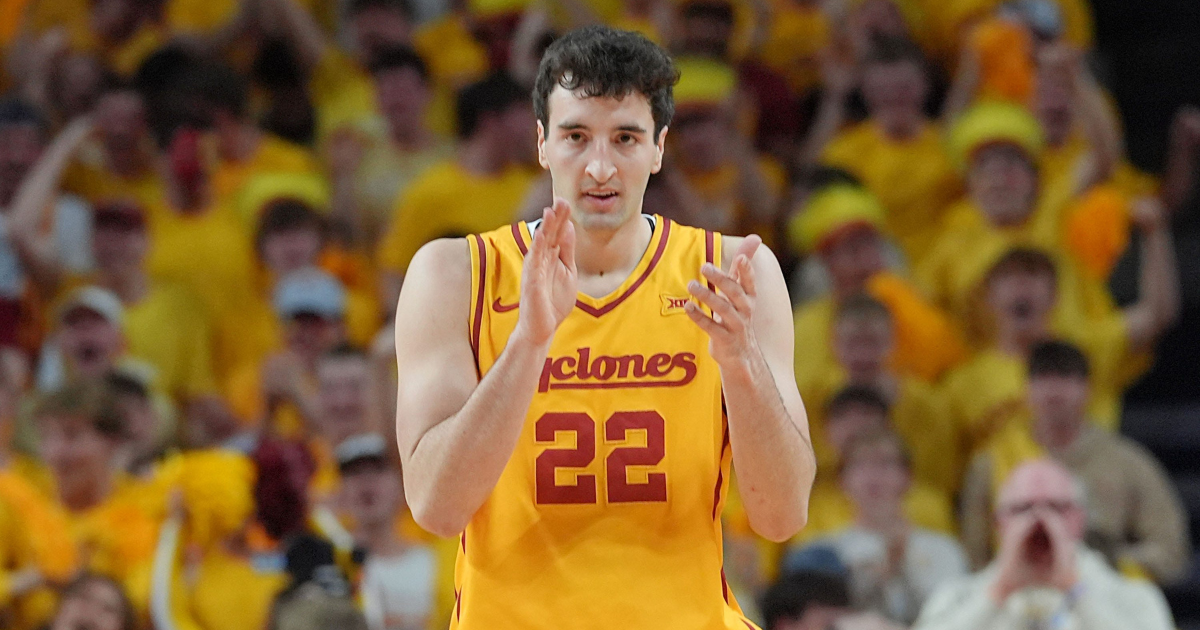 Iowa State Cyclones forward Milan Momcilovic (22) takes a three-point shot over Texas Tech Red Raiders guard Jaylen Petty (11) during the second half in the Big-12 conference men’s basketball showdown on Feb. 28, 2026, at Hilton Coliseum in Ames, Iowa. © Nirmalendu Majumdar/Ames Tribune / USA TODAY NETWORK via Imagn Images