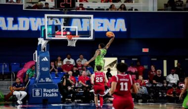 USF's Izaiyah Nelson (35) slams home 2 of his 9 points during the Bulls' 83-81 win at FAU in February in Boca Raton. (Courtesy of USF Athletics)