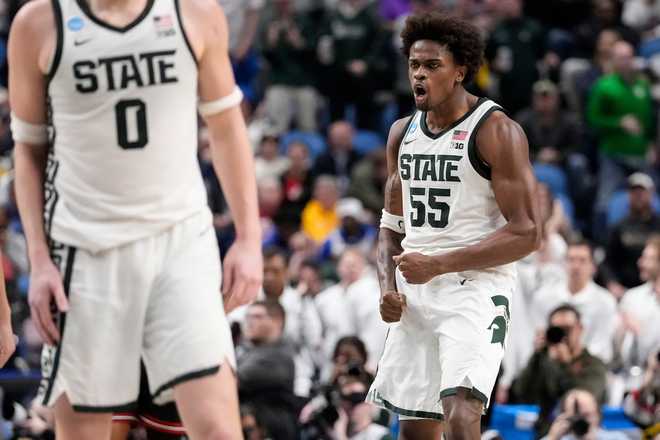 Coen Carr Michigan State forward Coen Carr (55) reacts after dunking against Louisville during the second half in the second round of the NCAA college basketball tournament, Saturday, March 21, 2026, in Buffalo, N.Y. (AP Photo/Yuki Iwamura)