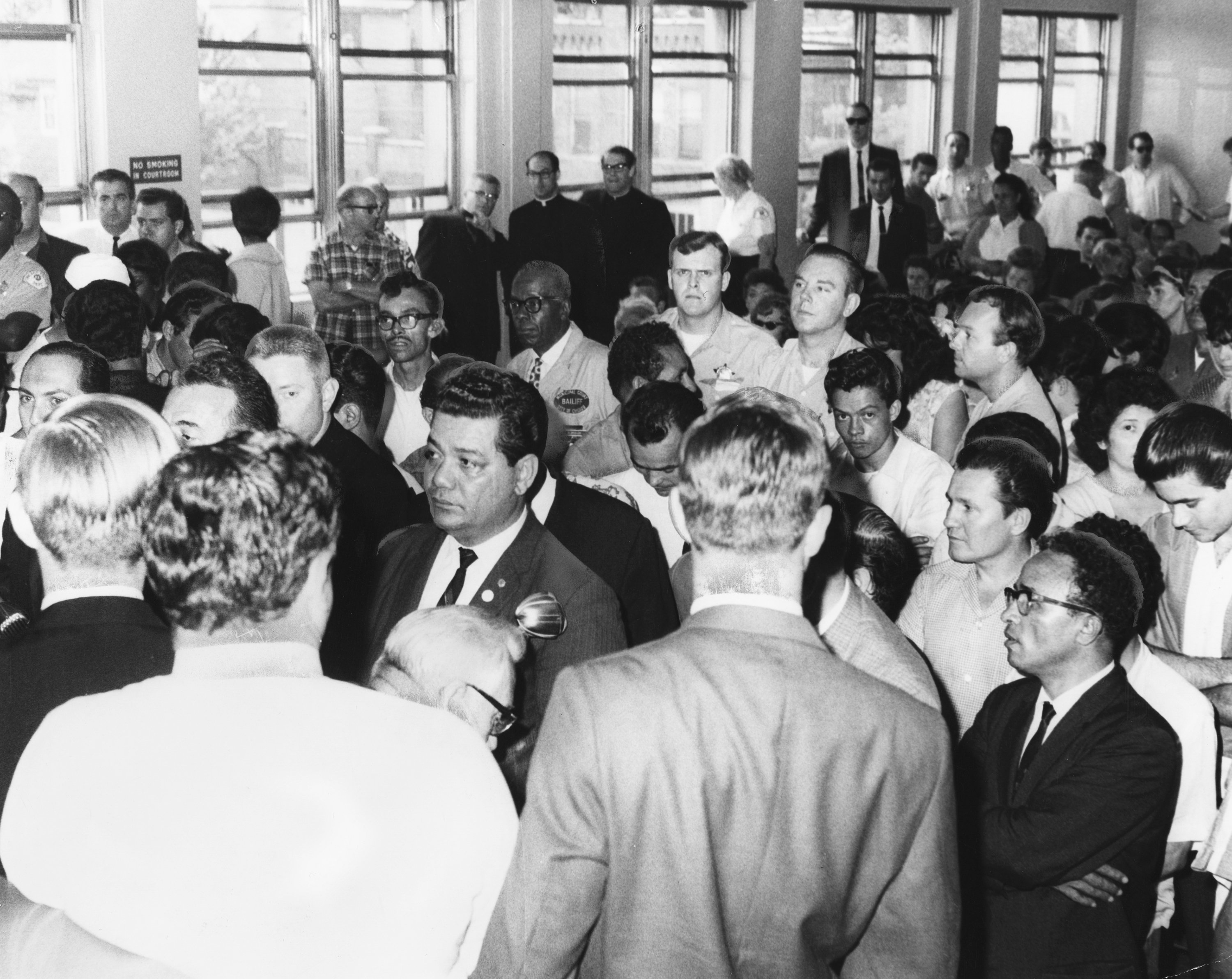 A crowd forms inside the