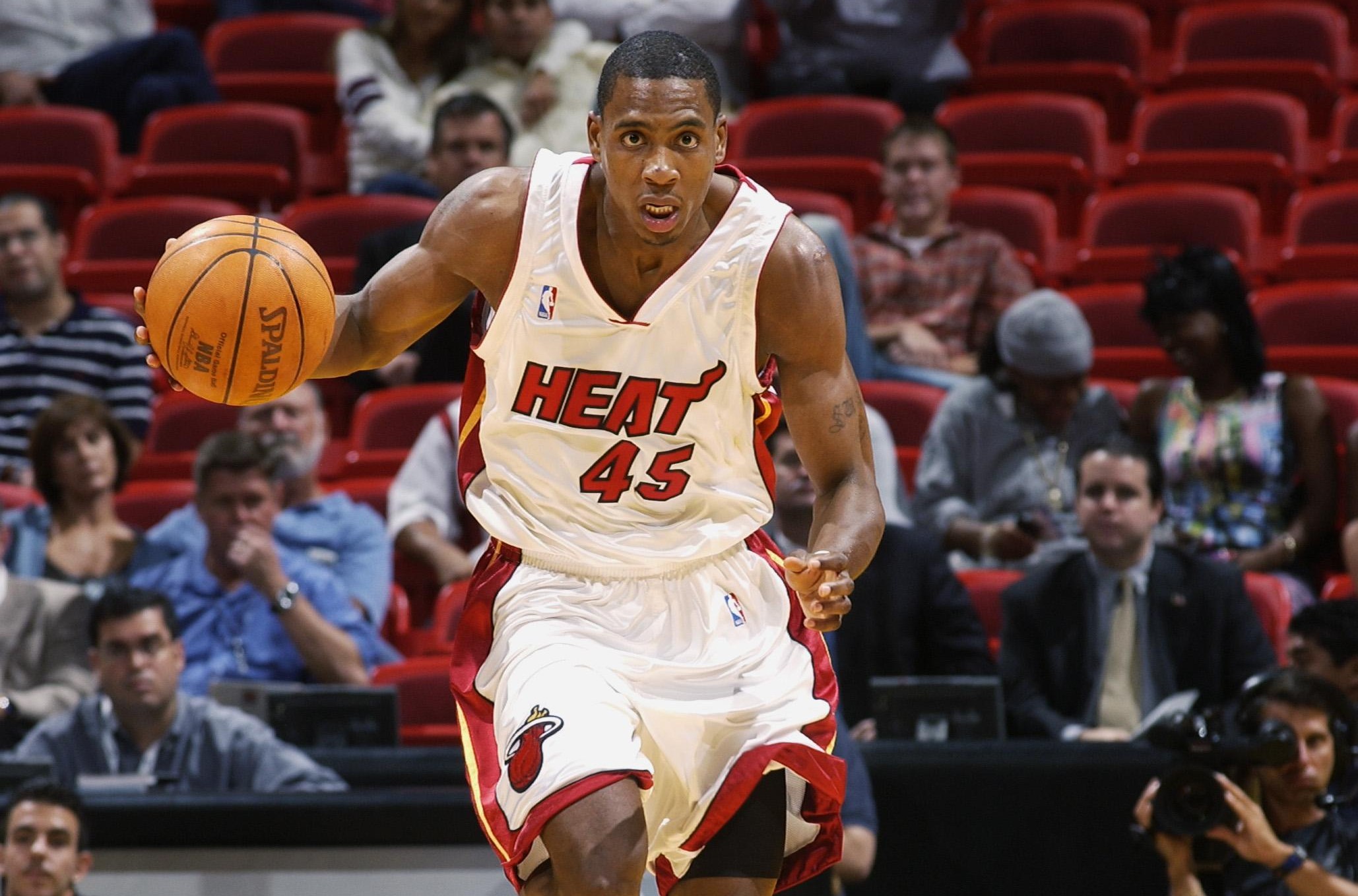 MIAMI - NOVEMBER 5: Forward Rasual Butler #45 of the Miami Heat dribbles the ball up the court against the Indiana Pacers during the game on November 5, 2002 at American Airlines Arena in Miami, Florida. The Pacers won 83-79. NOTE TO USER: User expressly acknowledges and agrees that, by downloading and or using this photograph, User is consenting to the terms and conditions of the Getty Images License Agreement. Mandatory copyright notice: Copyright NBAE 2002 (Photo by Victor Baldizon/NBAE via Getty Images)